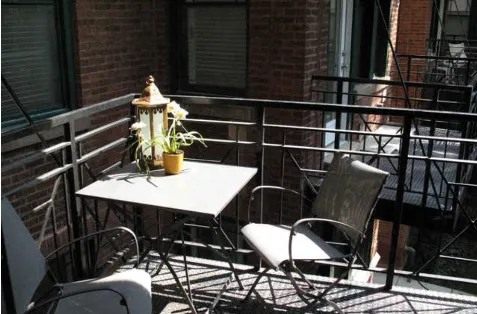 a view of a workspace with furniture