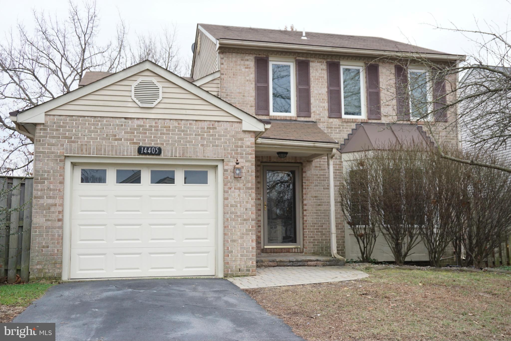 14405 Colonels Choice Road Upper Marlboro, MD 20772 - Photo 2 of 18 a front view of a house with a yard