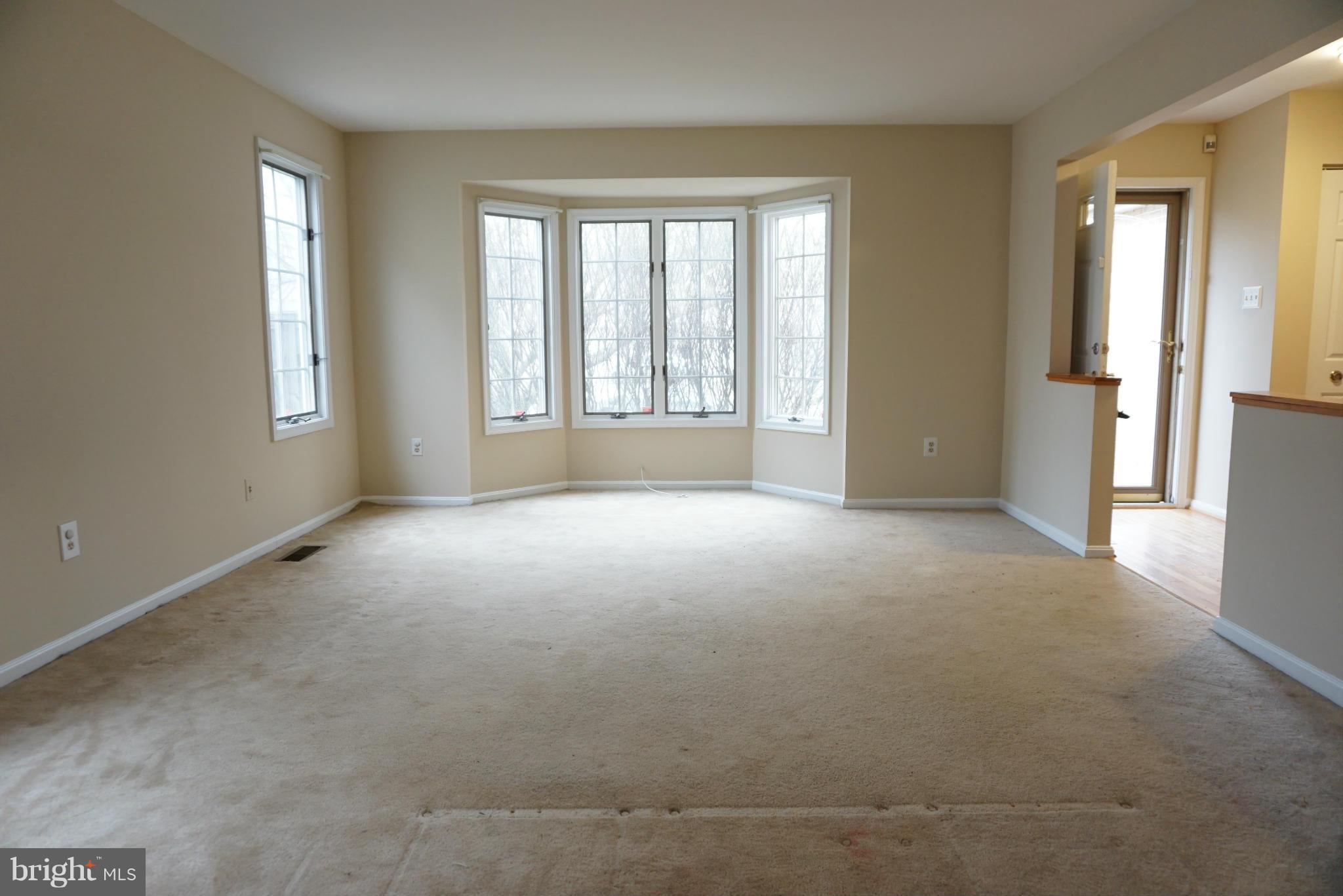 14405 Colonels Choice Road Upper Marlboro, MD 20772 - Photo 3 of 18 a view of an empty room with a window