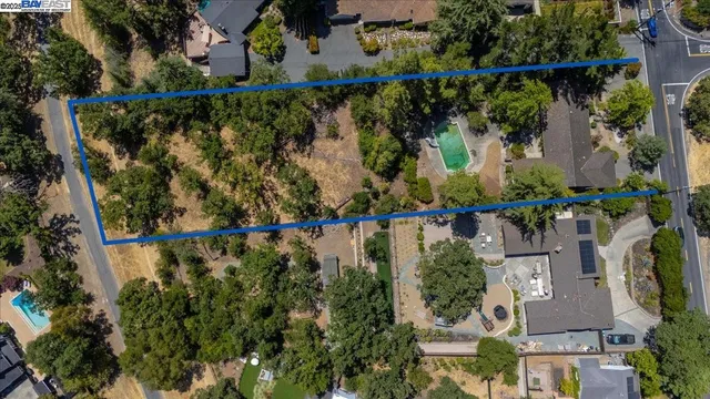 an aerial view of houses and roads