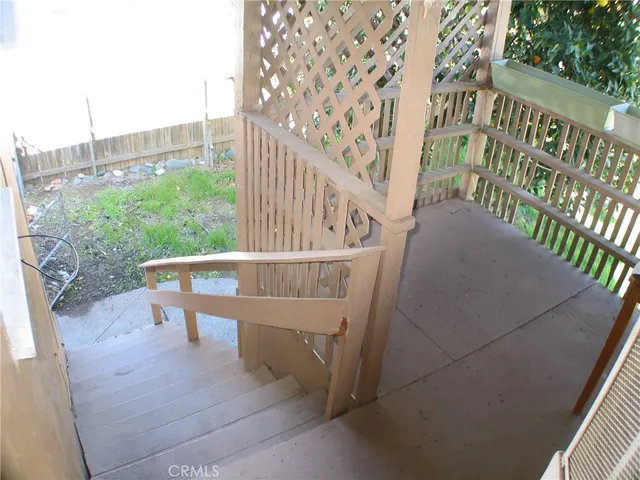 a view of entryway with a front door