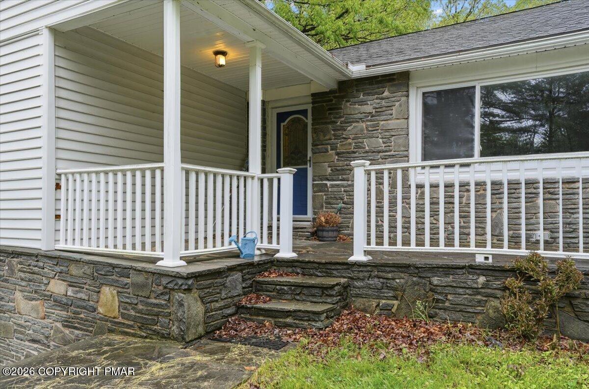 232 Garrity Road Hawley, PA 18428 - Photo 13 of 57 a side view of a house with a yard