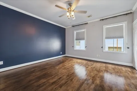 a kitchen with a stove and a refrigerator