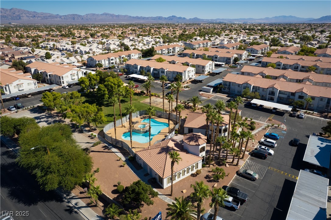 3318 North Decatur Boulevard, Unit 2149 Las Vegas, NV 89130 - Photo 23 of 26 Aerial view of residential area featuring a mountain backdrop