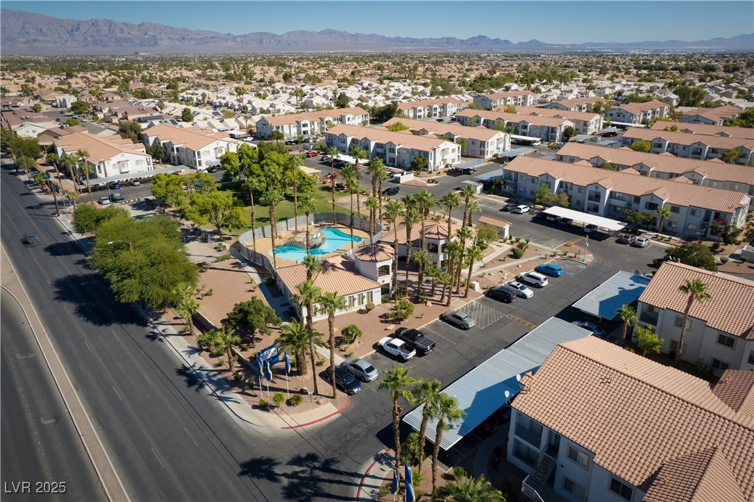 3318 North Decatur Boulevard, Unit 2149 Las Vegas, NV 89130 - Photo 24 of 26 Aerial view of residential area featuring a mountainous background