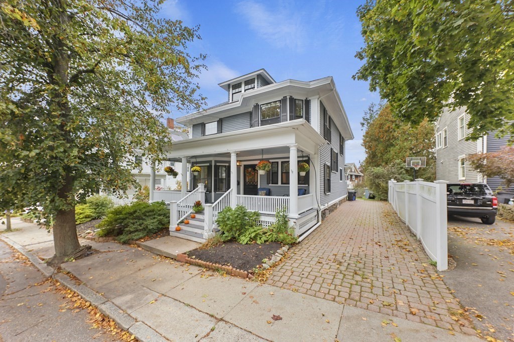 20 Columbus Avenue Beverly, MA 01915 - Photo 2 of 39 a front view of a house with garden