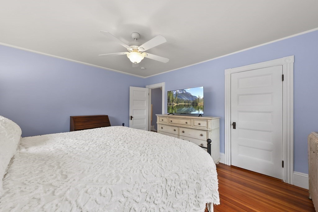 20 Columbus Avenue Beverly, MA 01915 - Photo 22 of 39 a bedroom with a bed and a dresser
