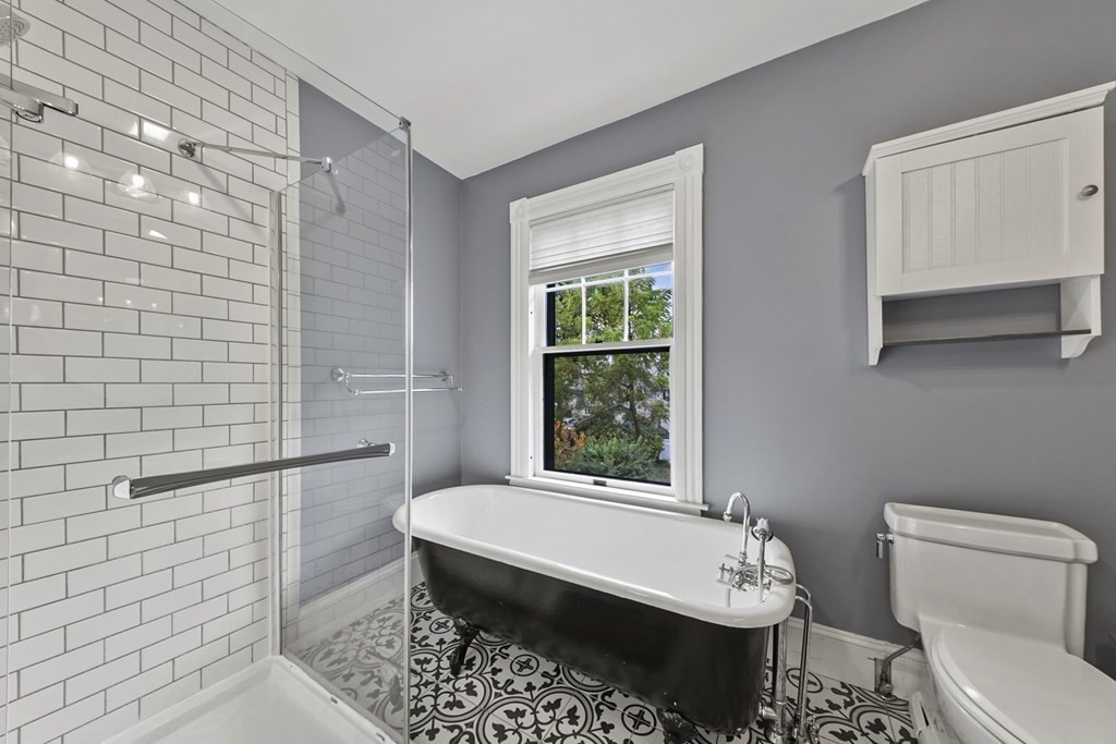 20 Columbus Avenue Beverly, MA 01915 - Photo 25 of 39 a bathroom with a sink toilet and shower
