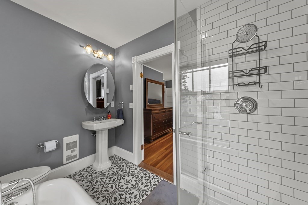 20 Columbus Avenue Beverly, MA 01915 - Photo 26 of 39 a bathroom with a sink a toilet and mirror