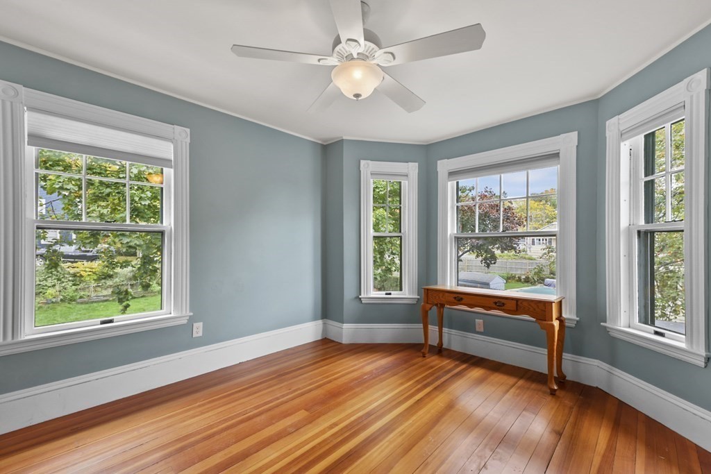 20 Columbus Avenue Beverly, MA 01915 - Photo 27 of 39 a view of room with window ceiling fan and hardwood floor