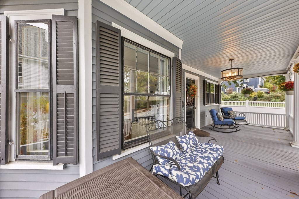 20 Columbus Avenue Beverly, MA 01915 - Photo 36 of 39 a bedroom with furniture and a large window