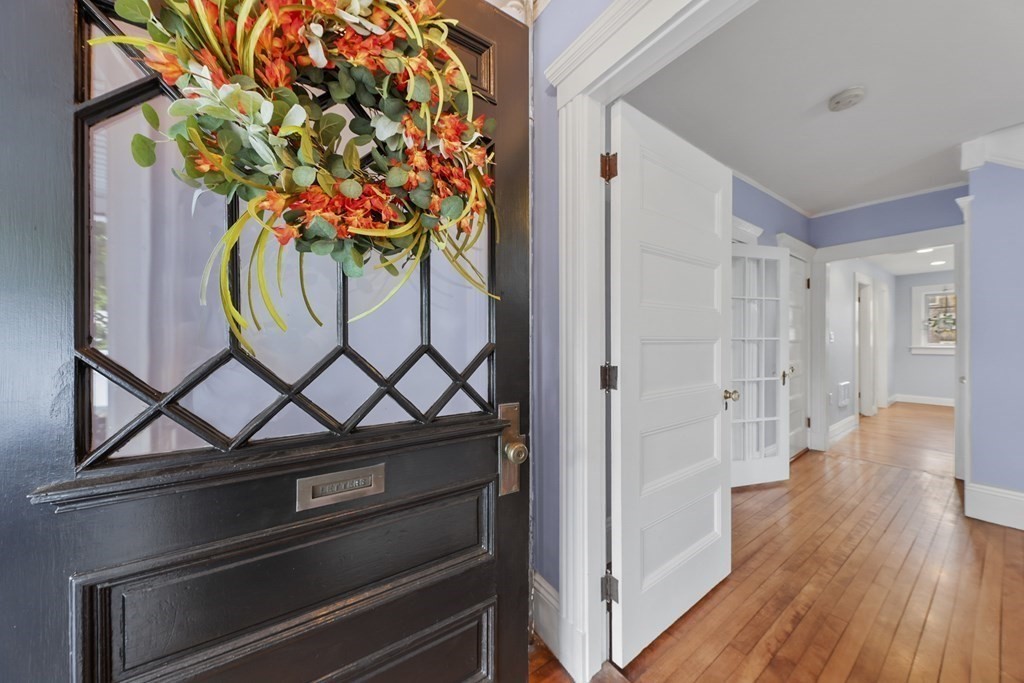 20 Columbus Avenue Beverly, MA 01915 - Photo 4 of 39 a hallway with wooden floor and entryway