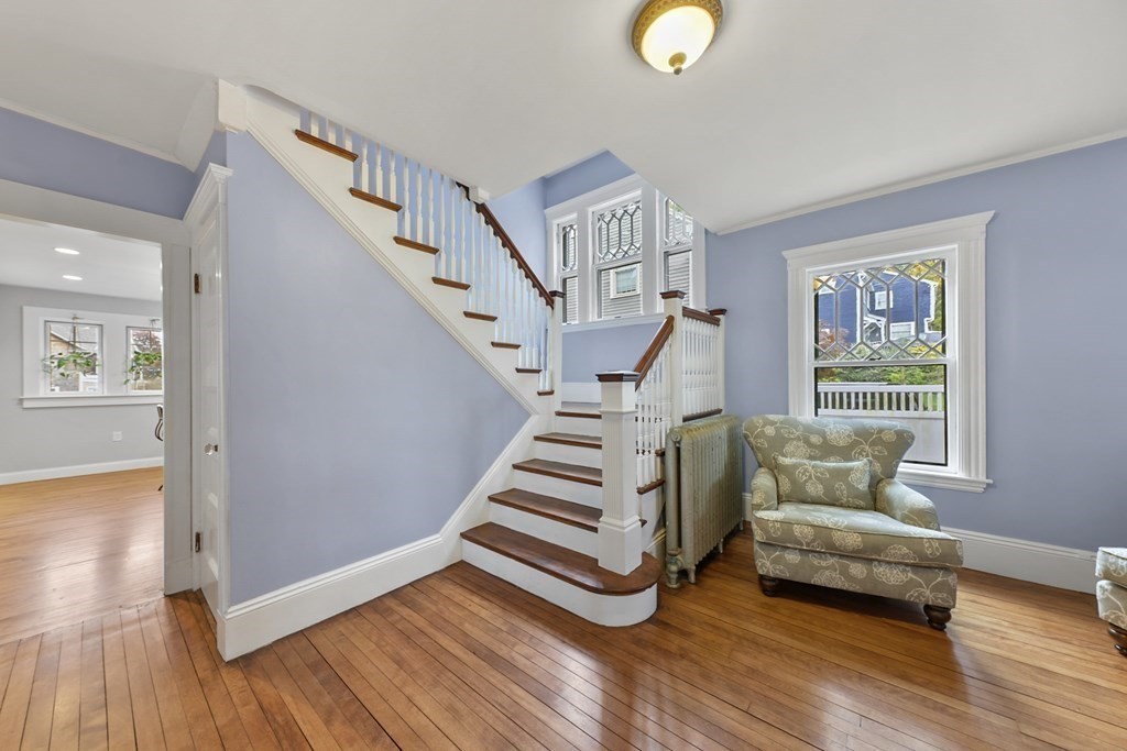20 Columbus Avenue Beverly, MA 01915 - Photo 6 of 39 a view of entryway and hall with wooden floor