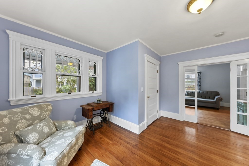 20 Columbus Avenue Beverly, MA 01915 - Photo 7 of 39 a living room with furniture and a large window