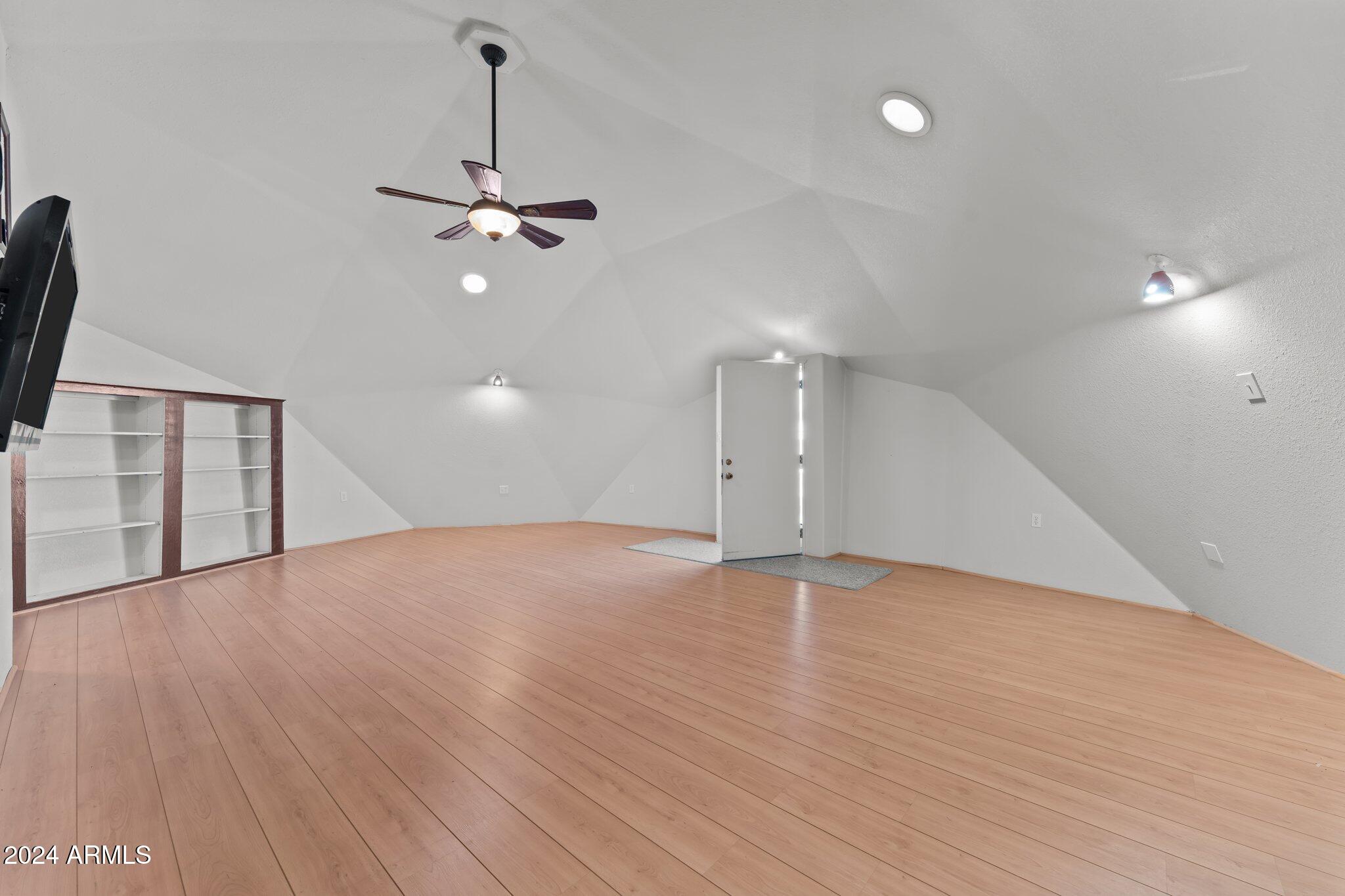 30857 Wandering Way Congress, AZ 85332 - Photo 14 of 35 a view of an empty room with glass door