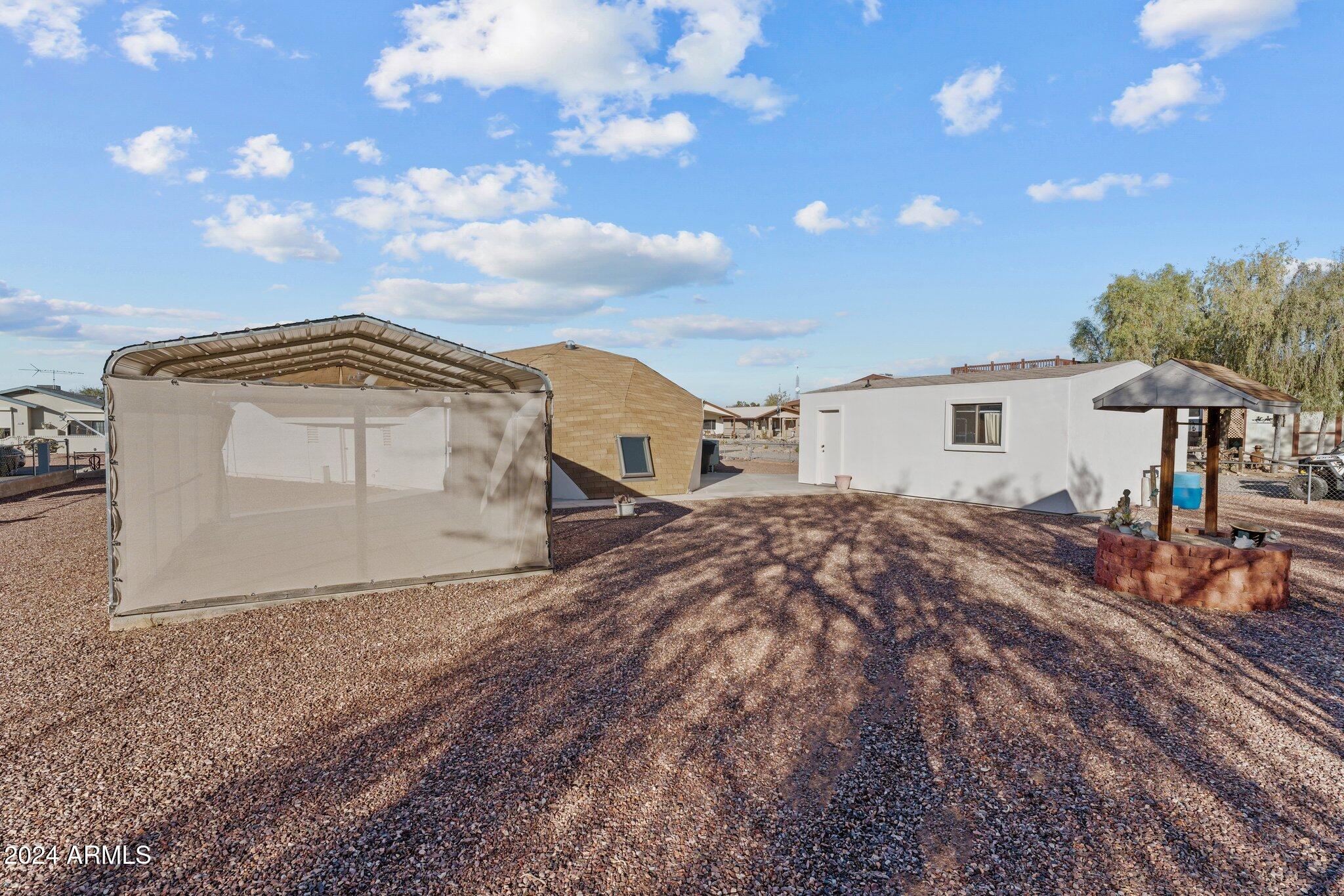 30857 Wandering Way Congress, AZ 85332 - Photo 33 of 35 a view of house and outdoor space