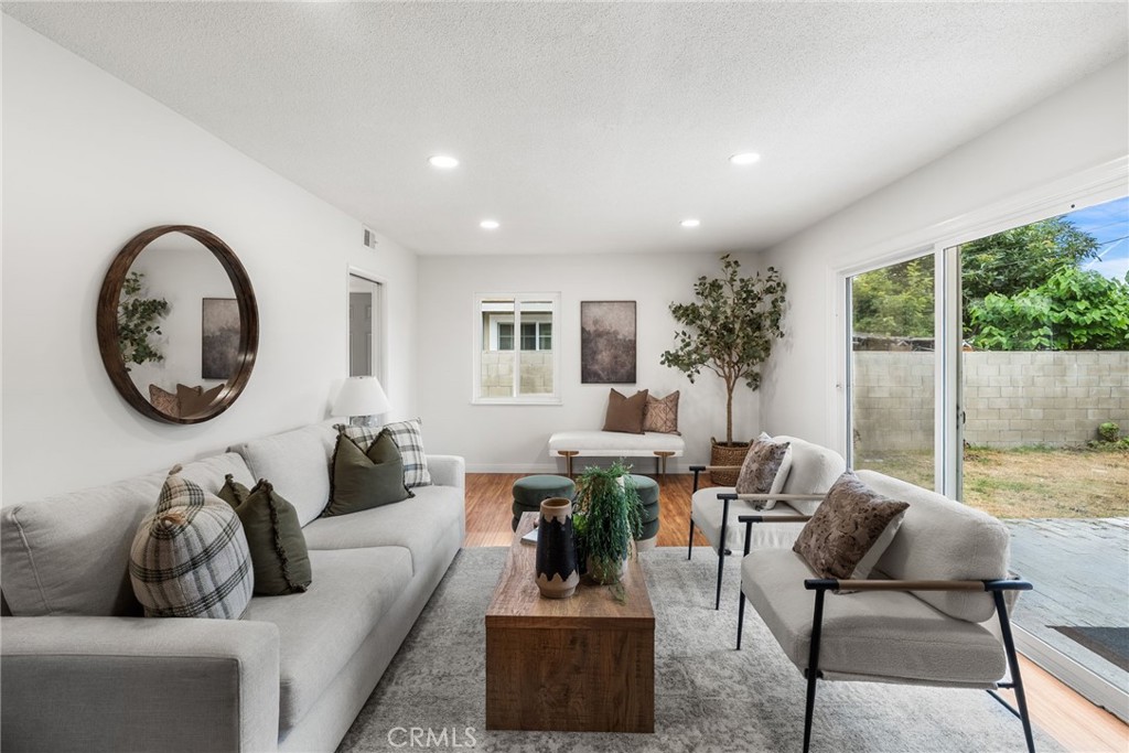 13361 Roxey Drive Garden Grove, CA 92843 - Photo 18 of 31 a living room with furniture and a large window