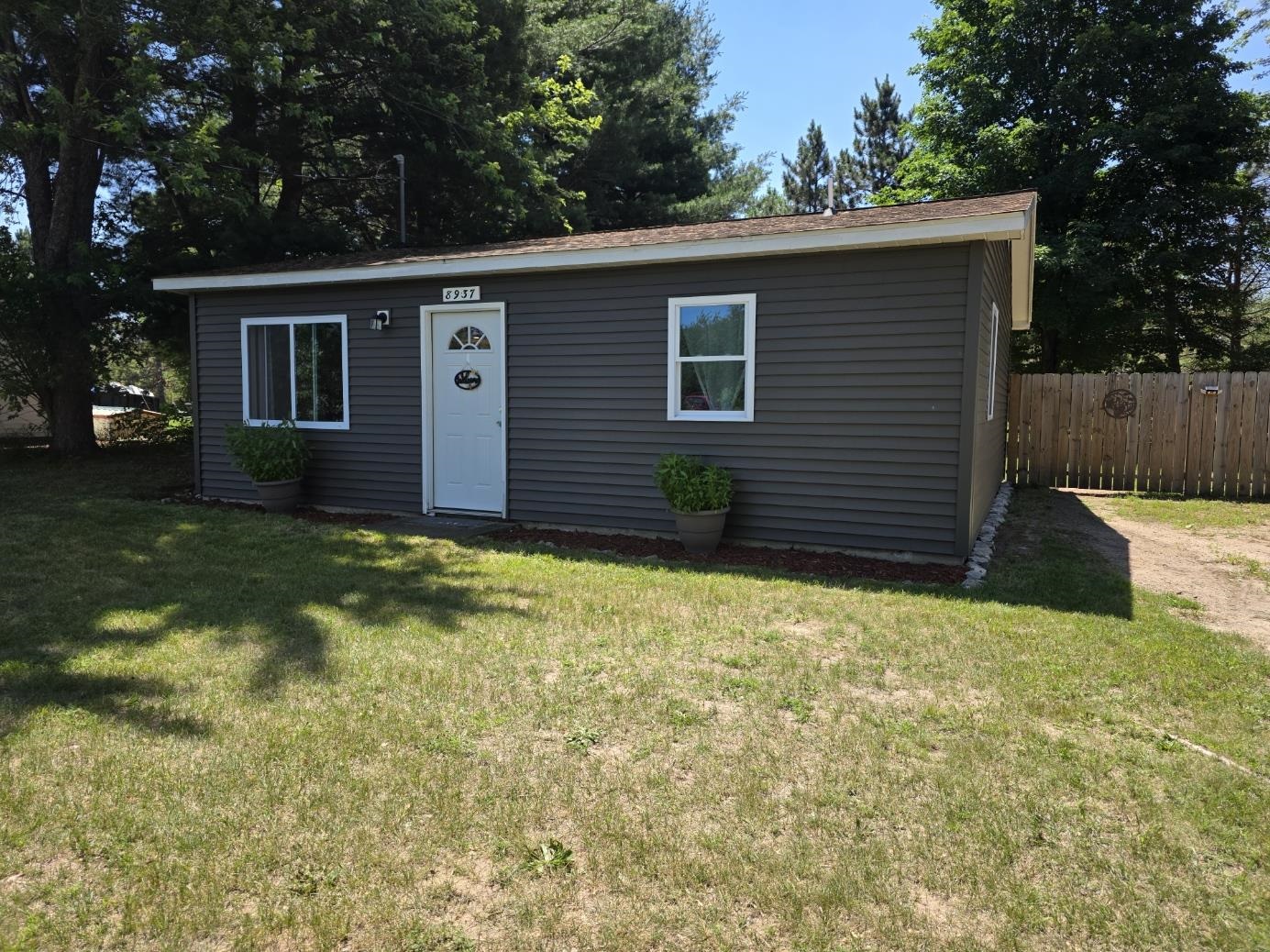 8937 Valley Road Northwest Rapid City, MI 49676 - Photo 2 of 26 1947711-47847d2e-7bf9-4c96-b5cf-bcb829dbe007.JPG