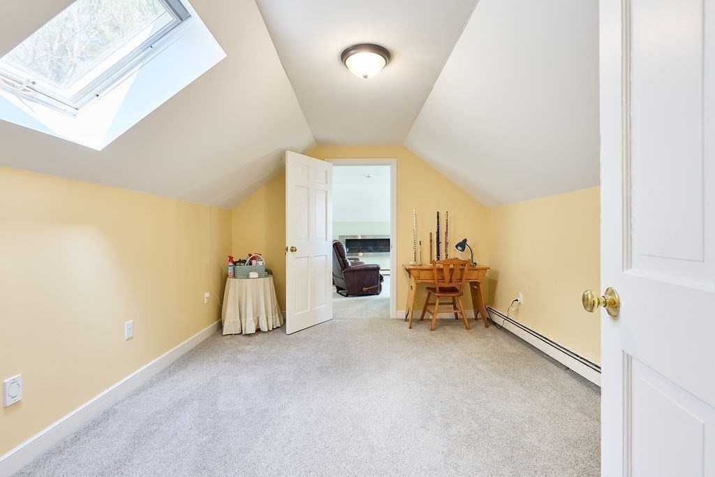 58 Buttercup Lane Hanover, MA 02339 - Photo 22 of 35 a living room with furniture and a table