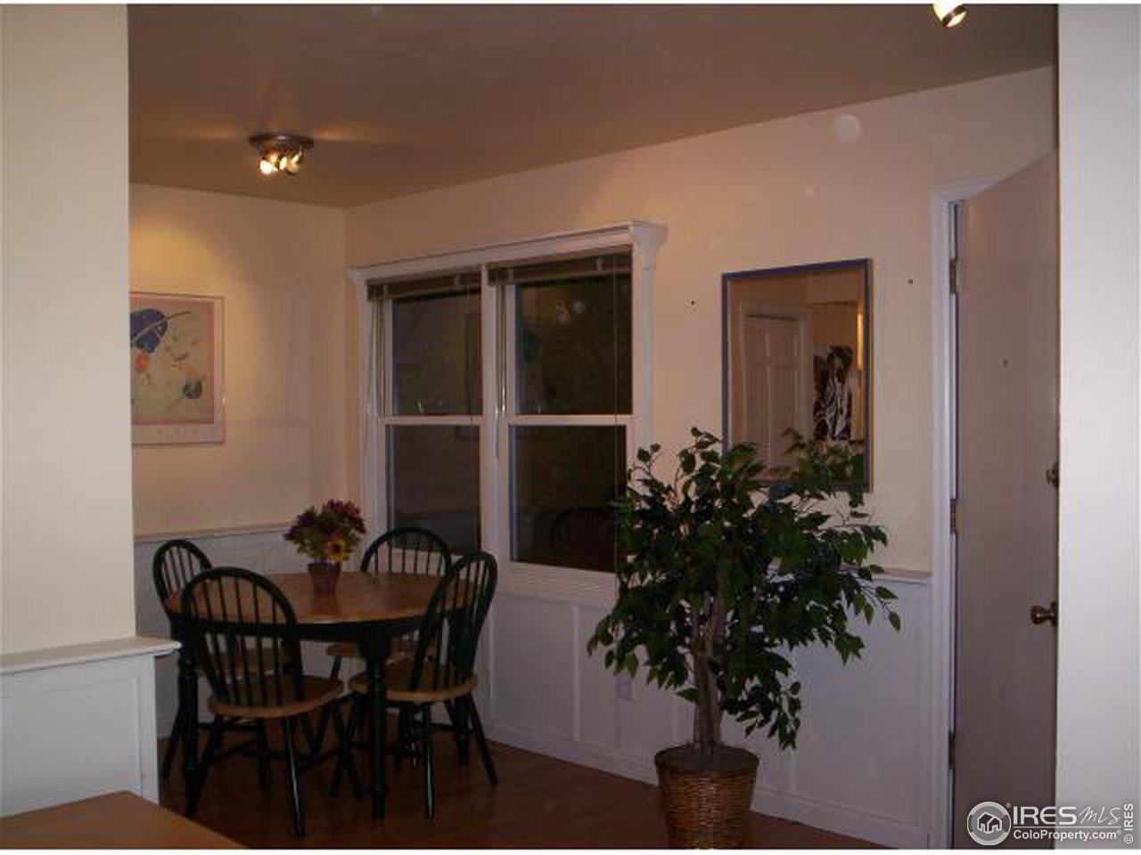 412 Pearl Street Boulder, CO 80302 - Photo 3 of 12 a living room with furniture potted plant and a window
