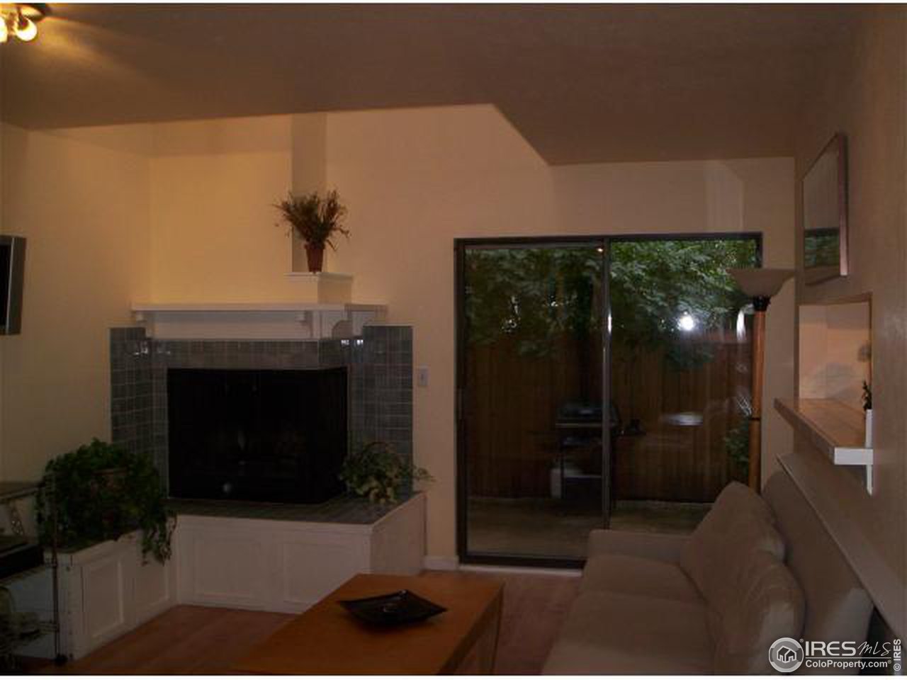 412 Pearl Street Boulder, CO 80302 - Photo 5 of 12 a living room with furniture and a fireplace
