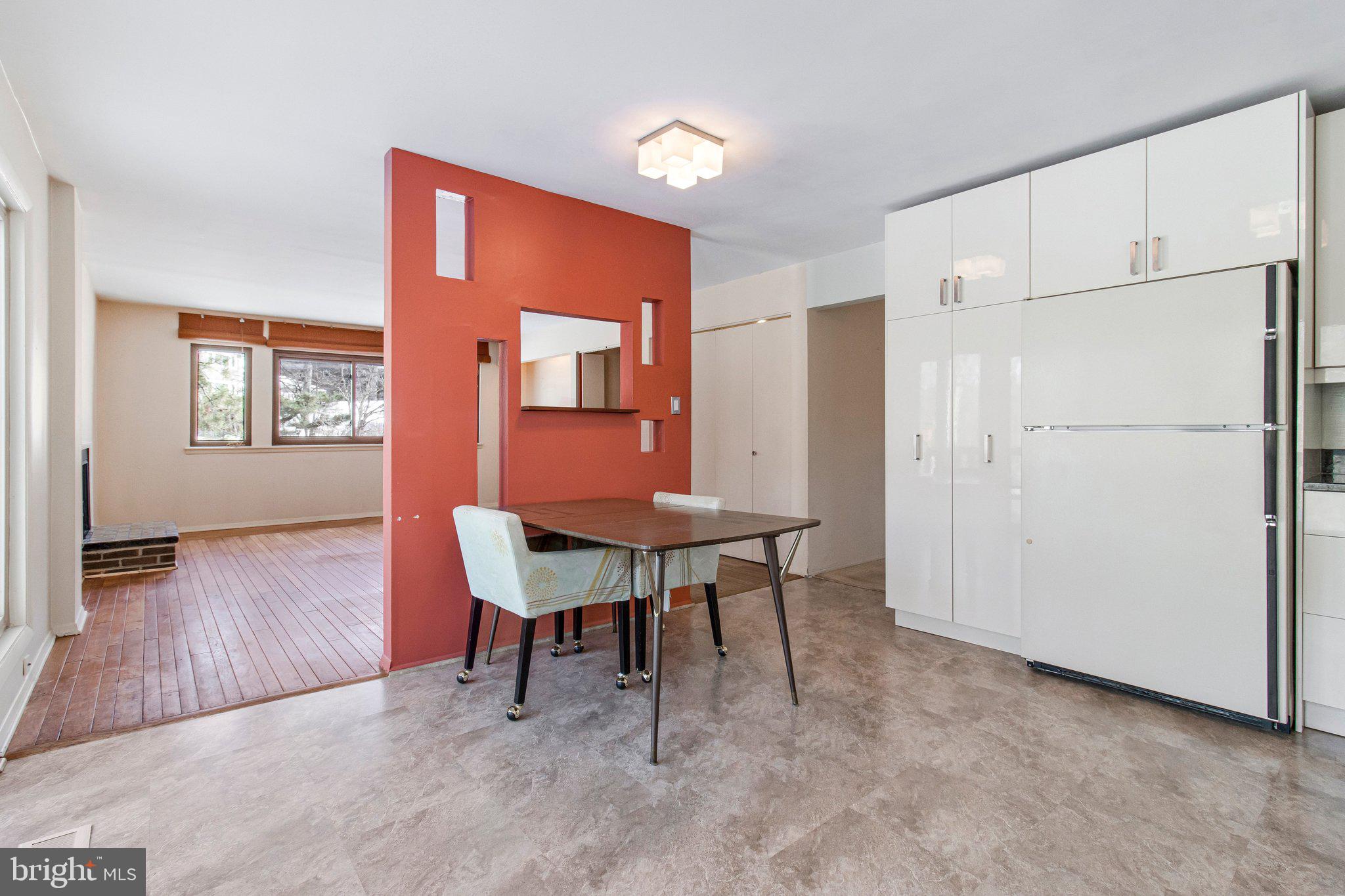 14816 Stonegate Terrace Silver Spring, MD 20905 - Photo 19 of 79 a view of kitchen with furniture and wooden floor
