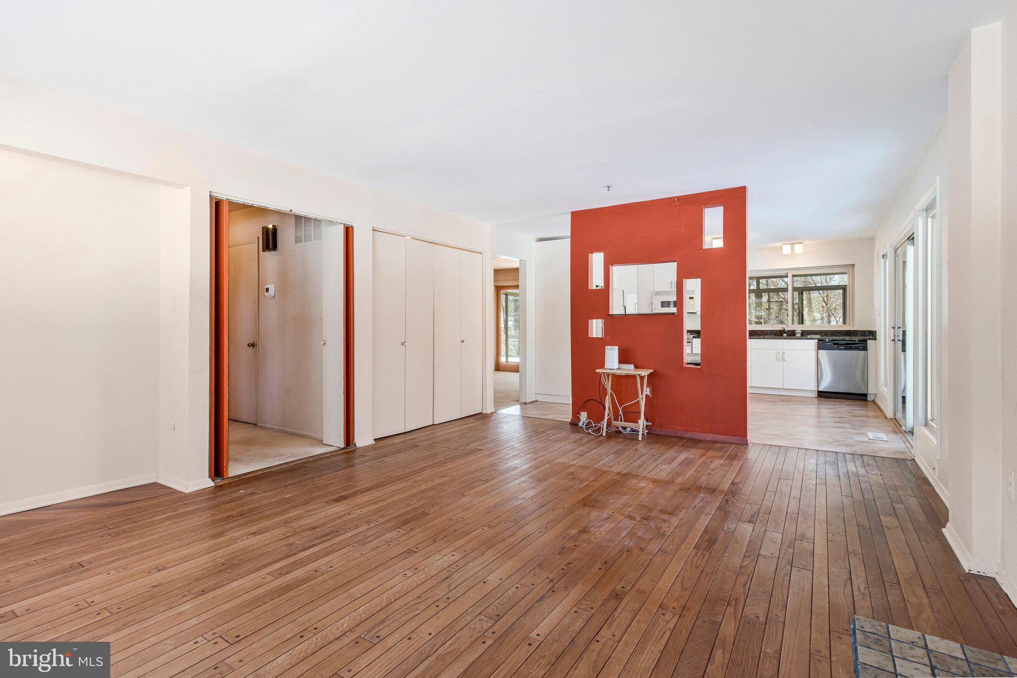 14816 Stonegate Terrace Silver Spring, MD 20905 - Photo 21 of 79 a view of a room with wooden floor and a cabinet