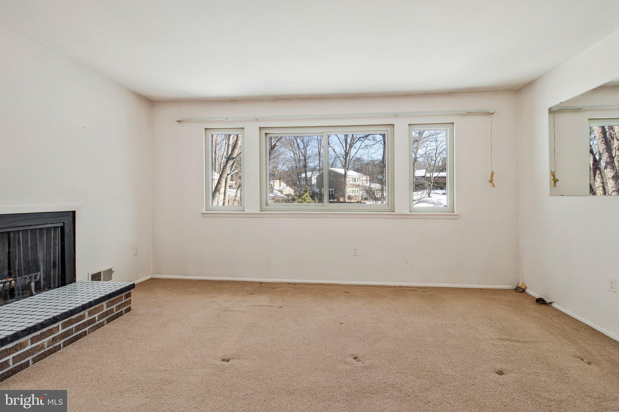 14816 Stonegate Terrace Silver Spring, MD 20905 - Photo 46 of 79 an empty room with windows