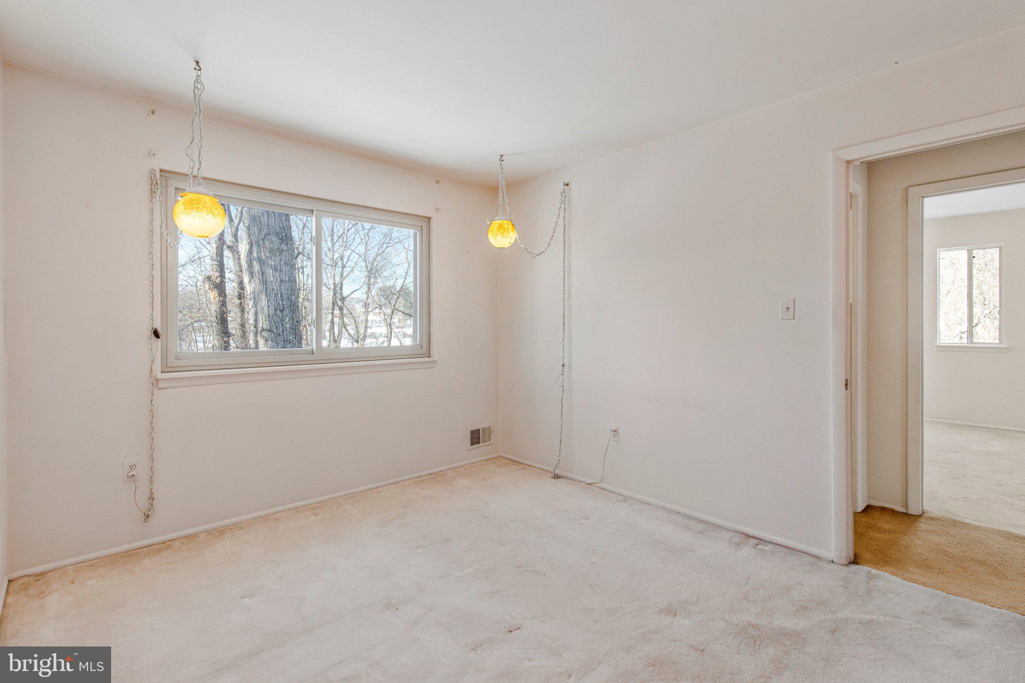 14816 Stonegate Terrace Silver Spring, MD 20905 - Photo 48 of 79 an empty room with windows and closet