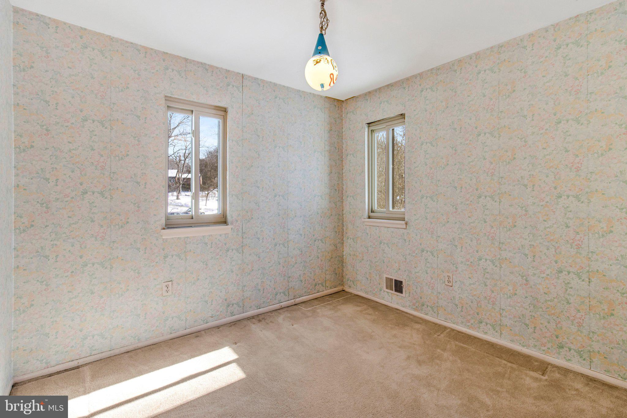 14816 Stonegate Terrace Silver Spring, MD 20905 - Photo 51 of 79 a view of an empty room with a window