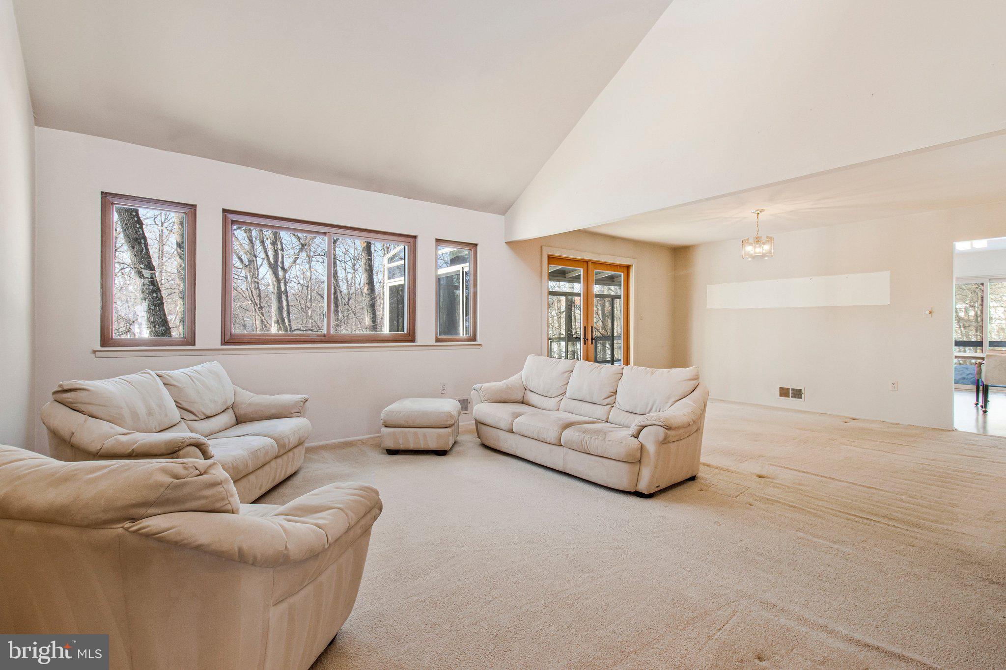 14816 Stonegate Terrace Silver Spring, MD 20905 - Photo 76 of 79 a living room with furniture and a large window