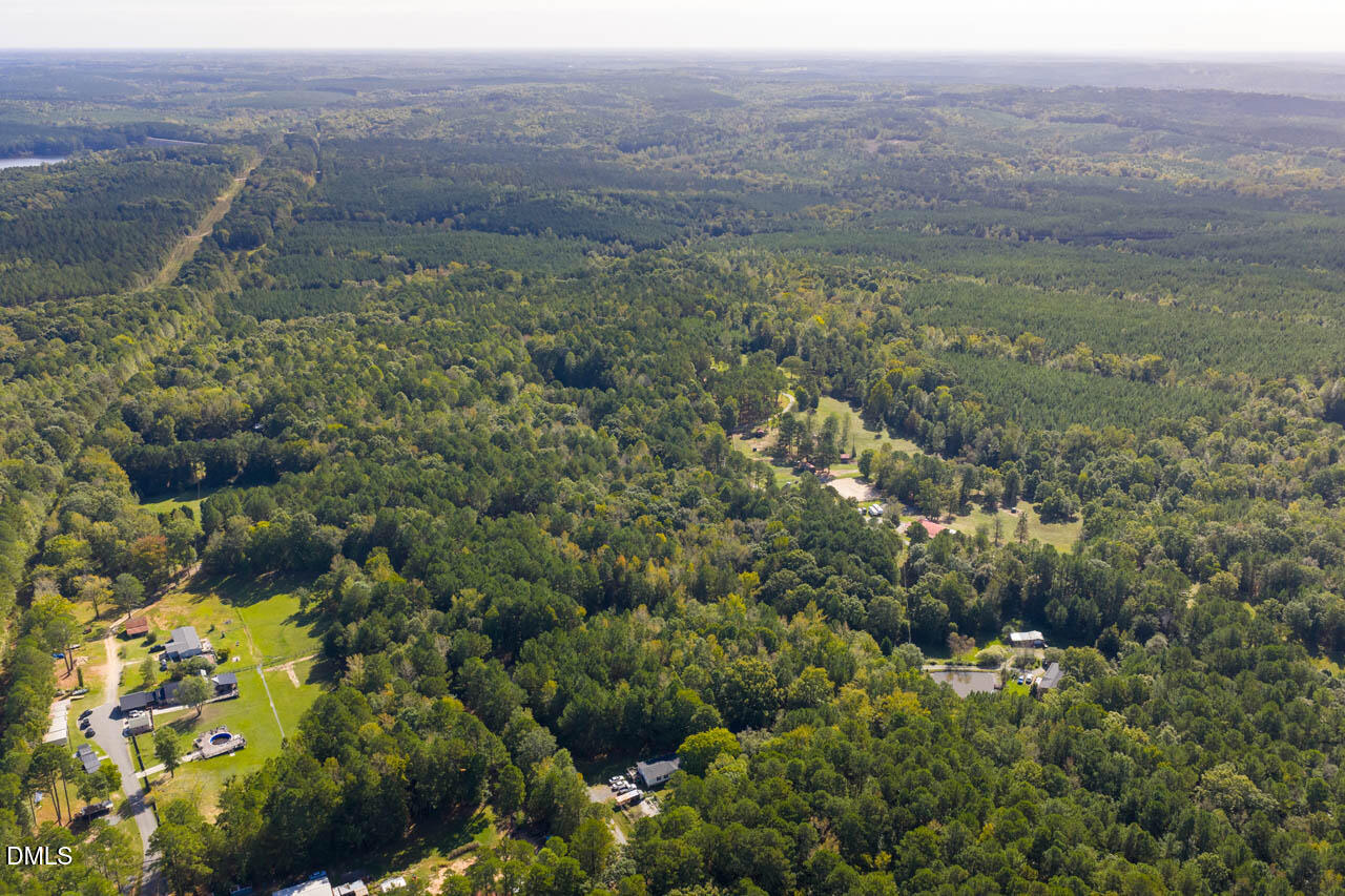 262 Ellis Road Moncure, NC 27559 - Photo 9 of 29 a view of a green field
