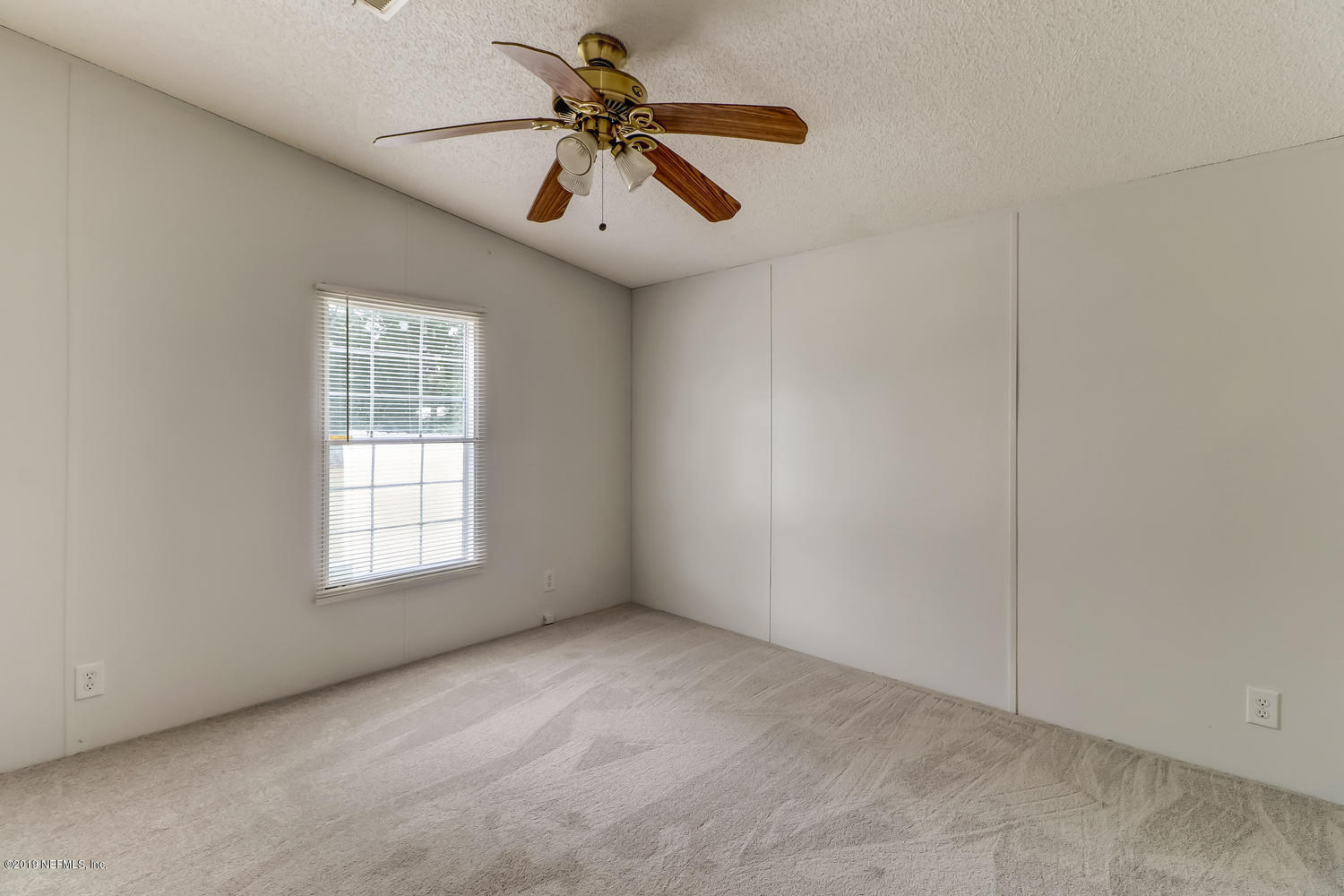 85354 Winona Bayview Road Yulee, FL 32097 - Photo 19 of 27 a view of an empty room with a window