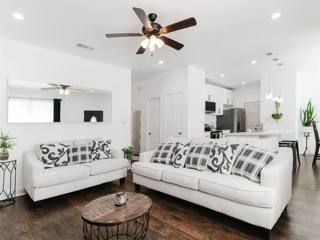 a view of a livingroom with furniture and a couch