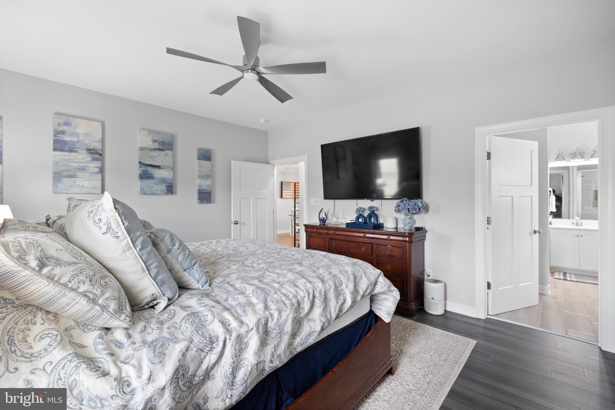 5175 Paynes Mill Road Bumpass, VA 23024 - Photo 21 of 55 a bedroom with a bed and a flat screen tv