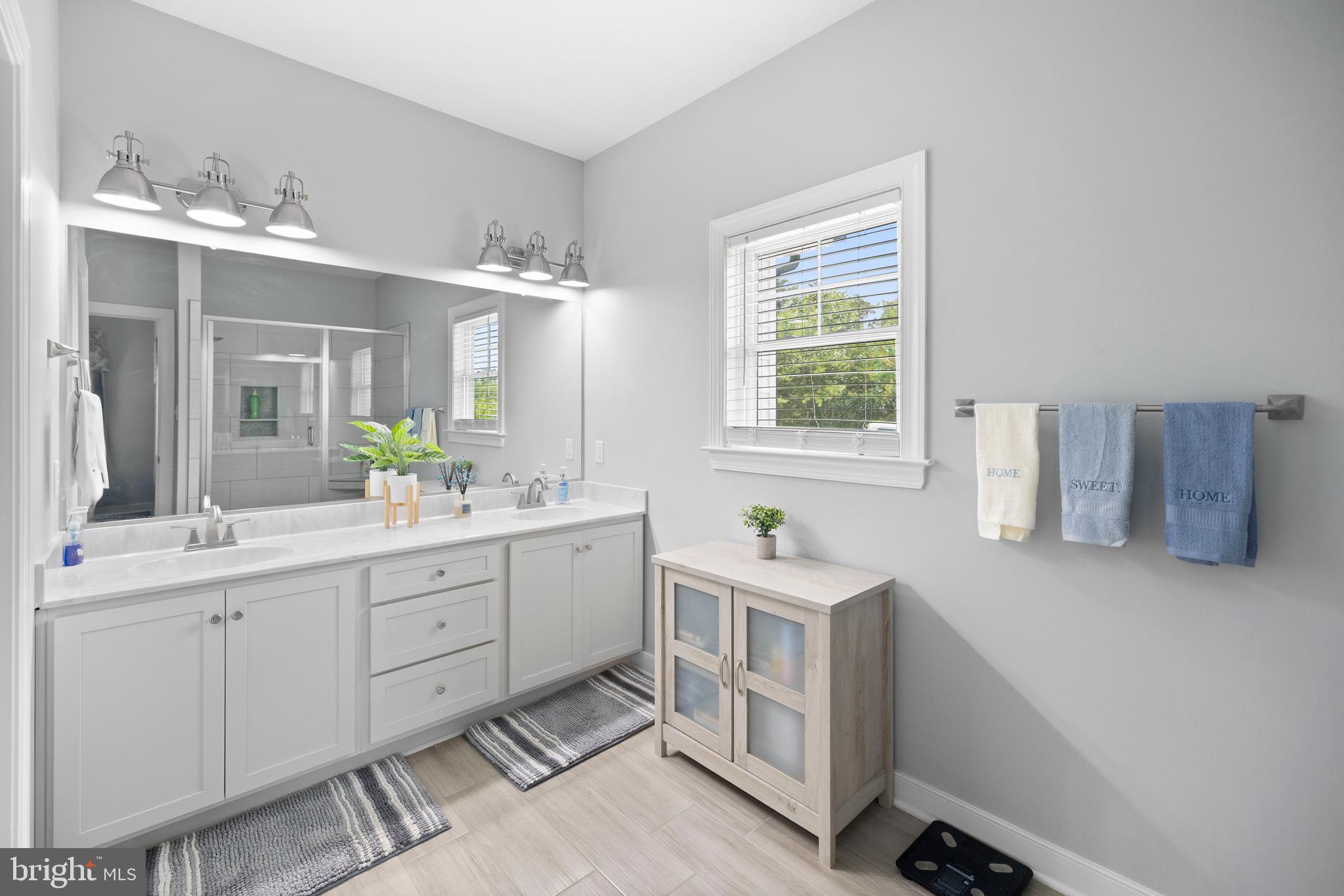 5175 Paynes Mill Road Bumpass, VA 23024 - Photo 22 of 55 a kitchen with sink cabinets and window