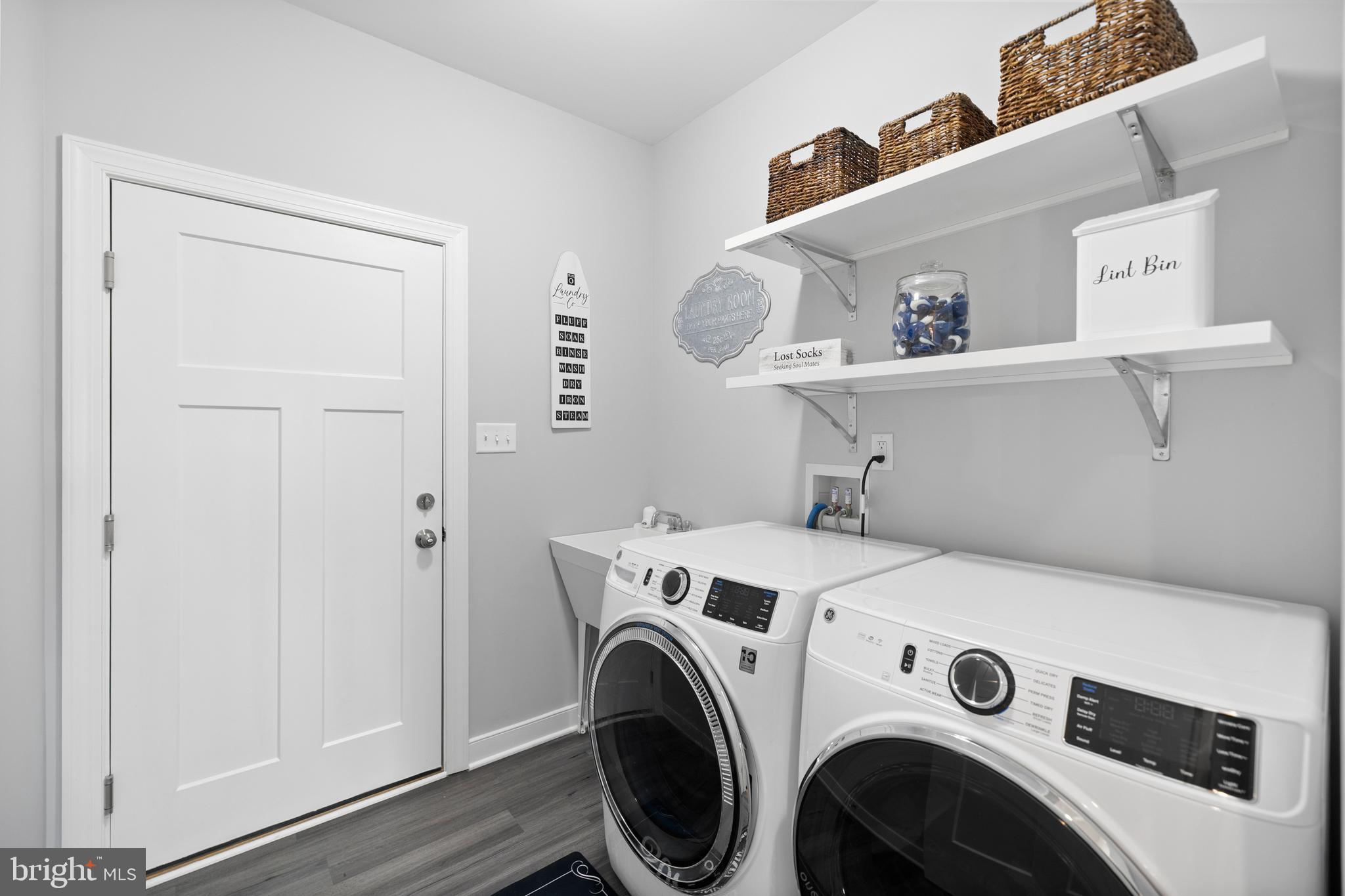 5175 Paynes Mill Road Bumpass, VA 23024 - Photo 31 of 55 a utility room with dryer and washer