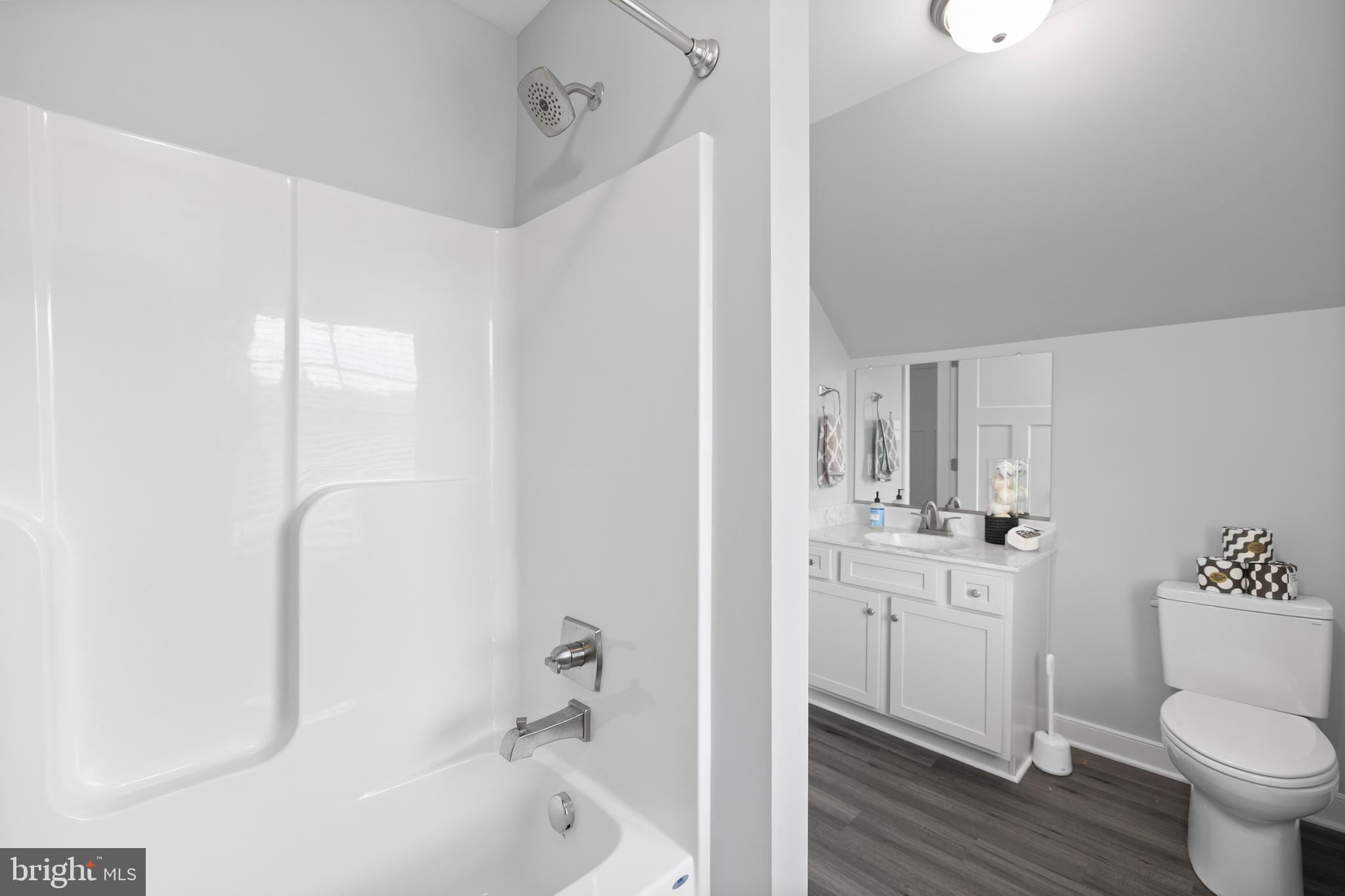 5175 Paynes Mill Road Bumpass, VA 23024 - Photo 39 of 55 a bathroom with a sink toilet and shower