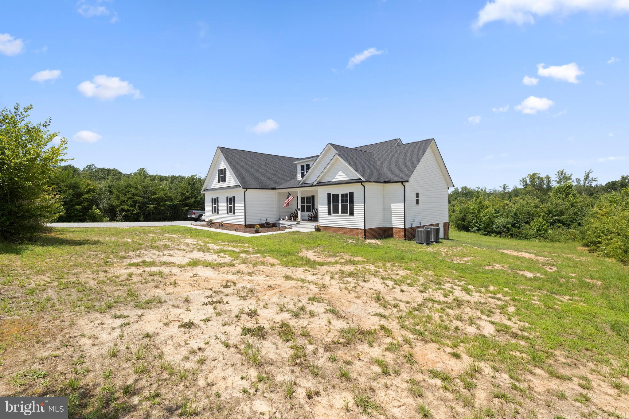 5175 Paynes Mill Road Bumpass, VA 23024 - Photo 42 of 55 a house view with a garden space