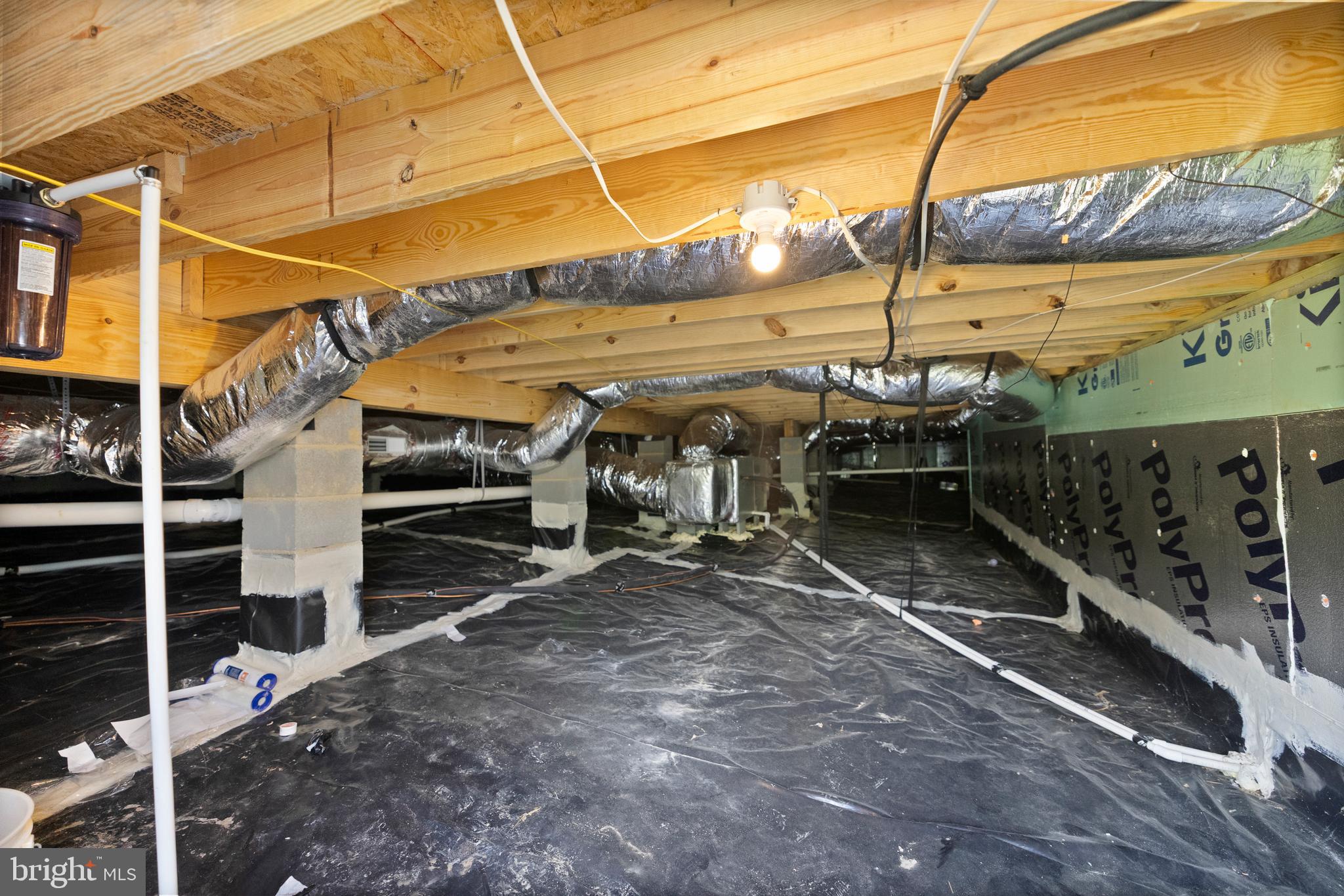 5175 Paynes Mill Road Bumpass, VA 23024 - Photo 48 of 55 a view of a garage with wooden fence