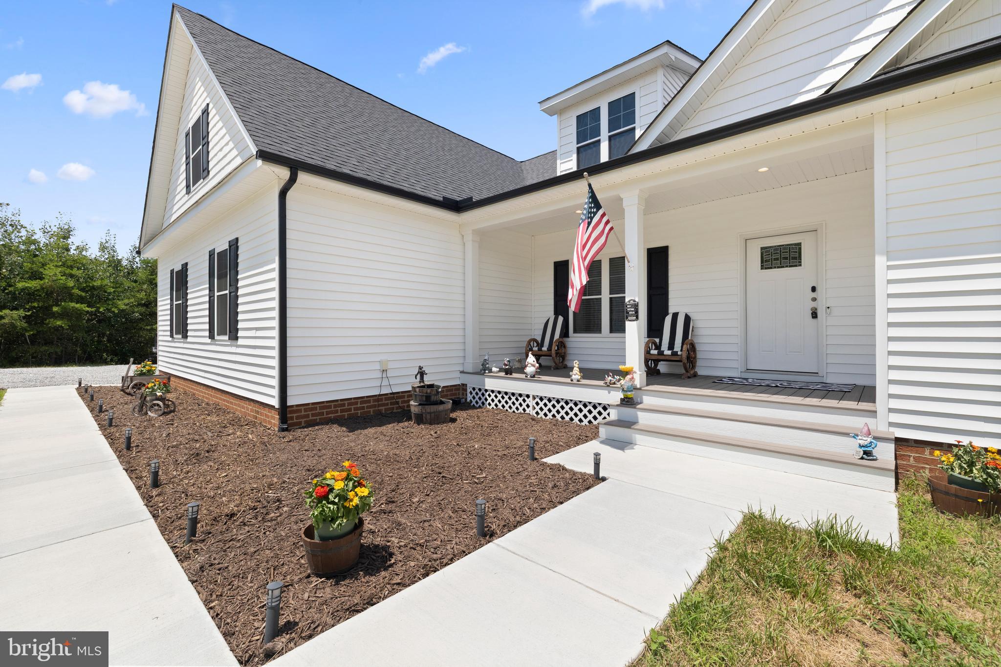 5175 Paynes Mill Road Bumpass, VA 23024 - Photo 53 of 55 a view of a house with backyard and sitting area