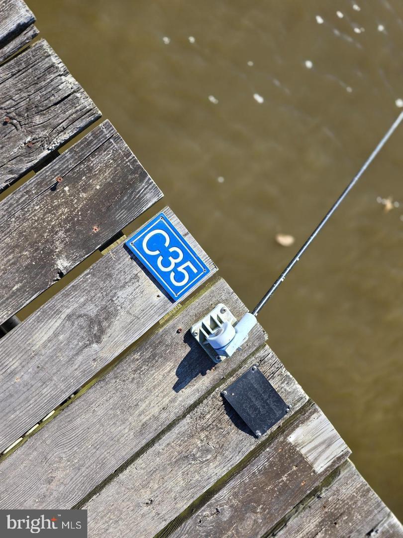 Point Road Elkton, MD 21921 - Photo 12 of 13 a wooden floor with a book and a bed