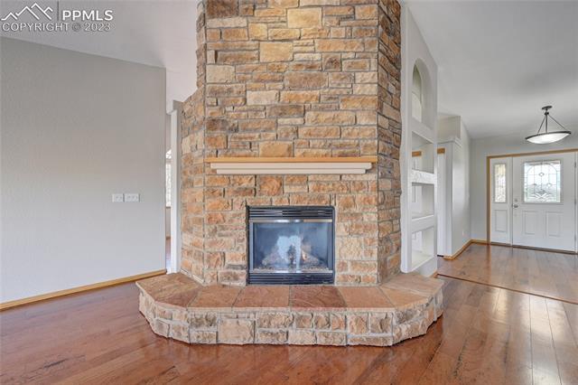 9932 Rockingham Drive Peyton, CO 80831 - Photo 4 of 7 Beautiful stone fireplace