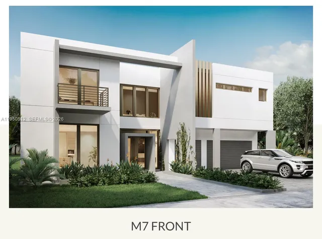 a front view of a house with a garden and parking