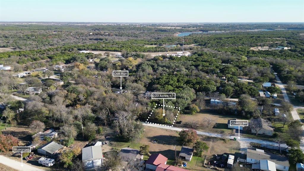 734-735 Cherry Road Whitney, TX 76692 - Photo 2 of 27 an aerial view of a city