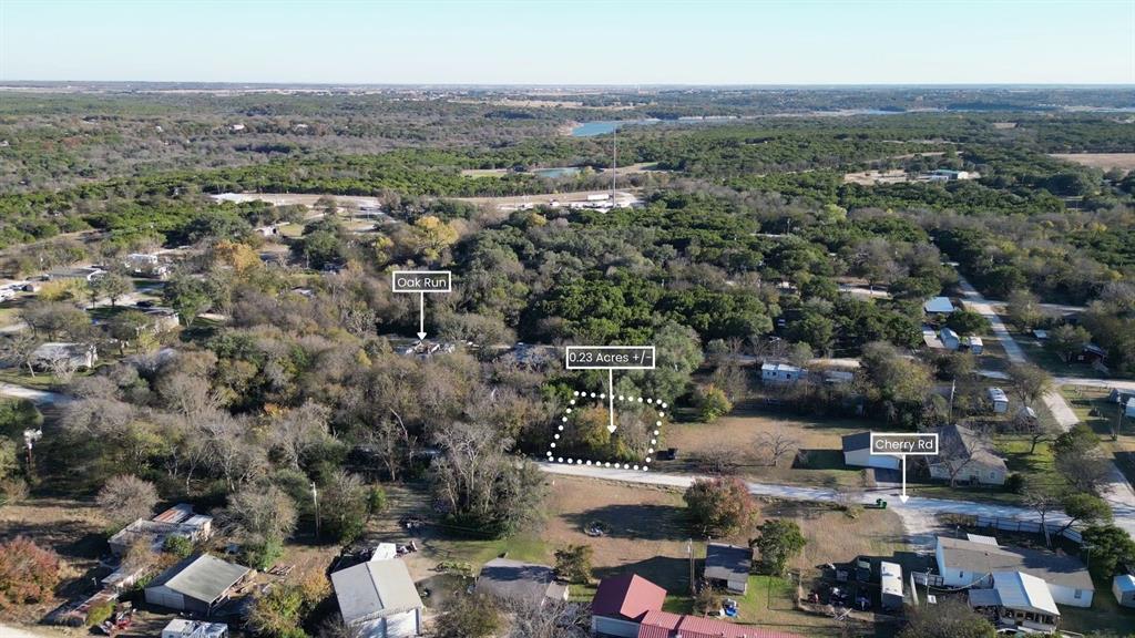734-735 Cherry Road Whitney, TX 76692 - Photo 3 of 27 an aerial view of a city