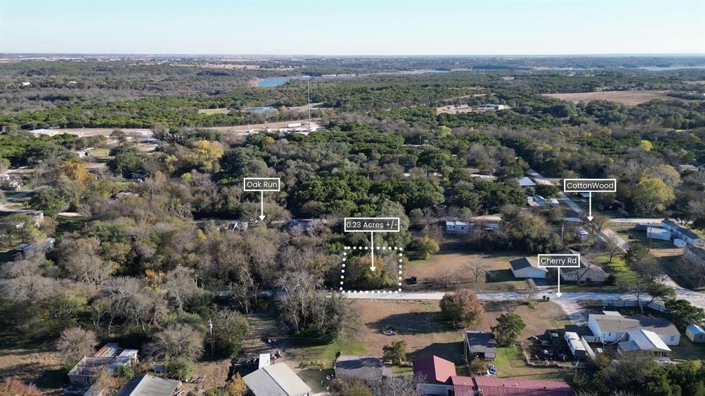 734-735 Cherry Road Whitney, TX 76692 - Photo 4 of 27 an aerial view of a city