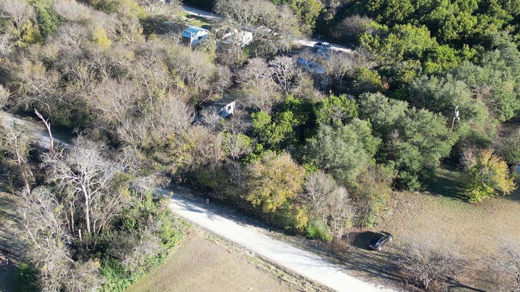734-735 Cherry Road Whitney, TX 76692 - Photo 10 of 27 a view of a yard with plants