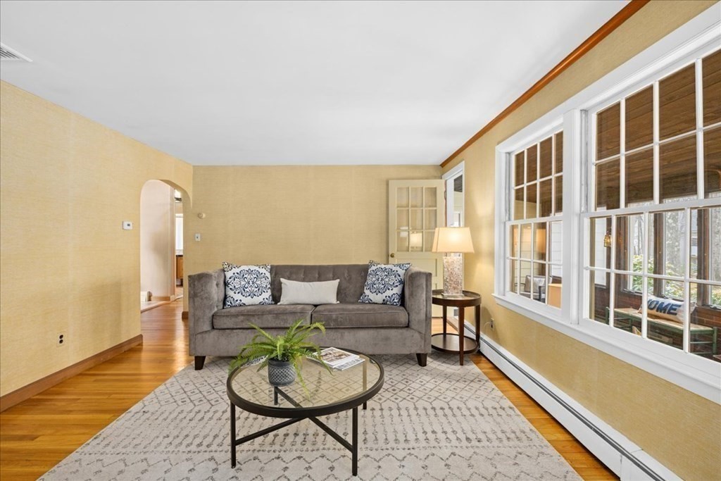 24 Oregon Road Ashland, MA 01721 - Photo 18 of 42 a living room with furniture and a large window