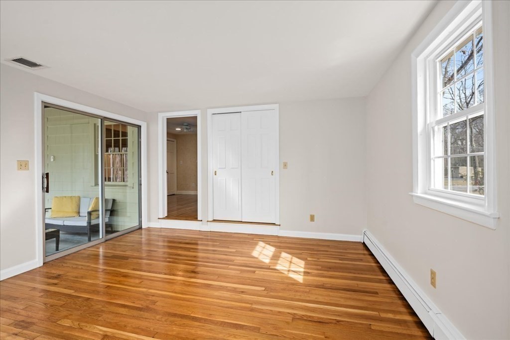 24 Oregon Road Ashland, MA 01721 - Photo 27 of 42 a view of a room with wooden floor and a window